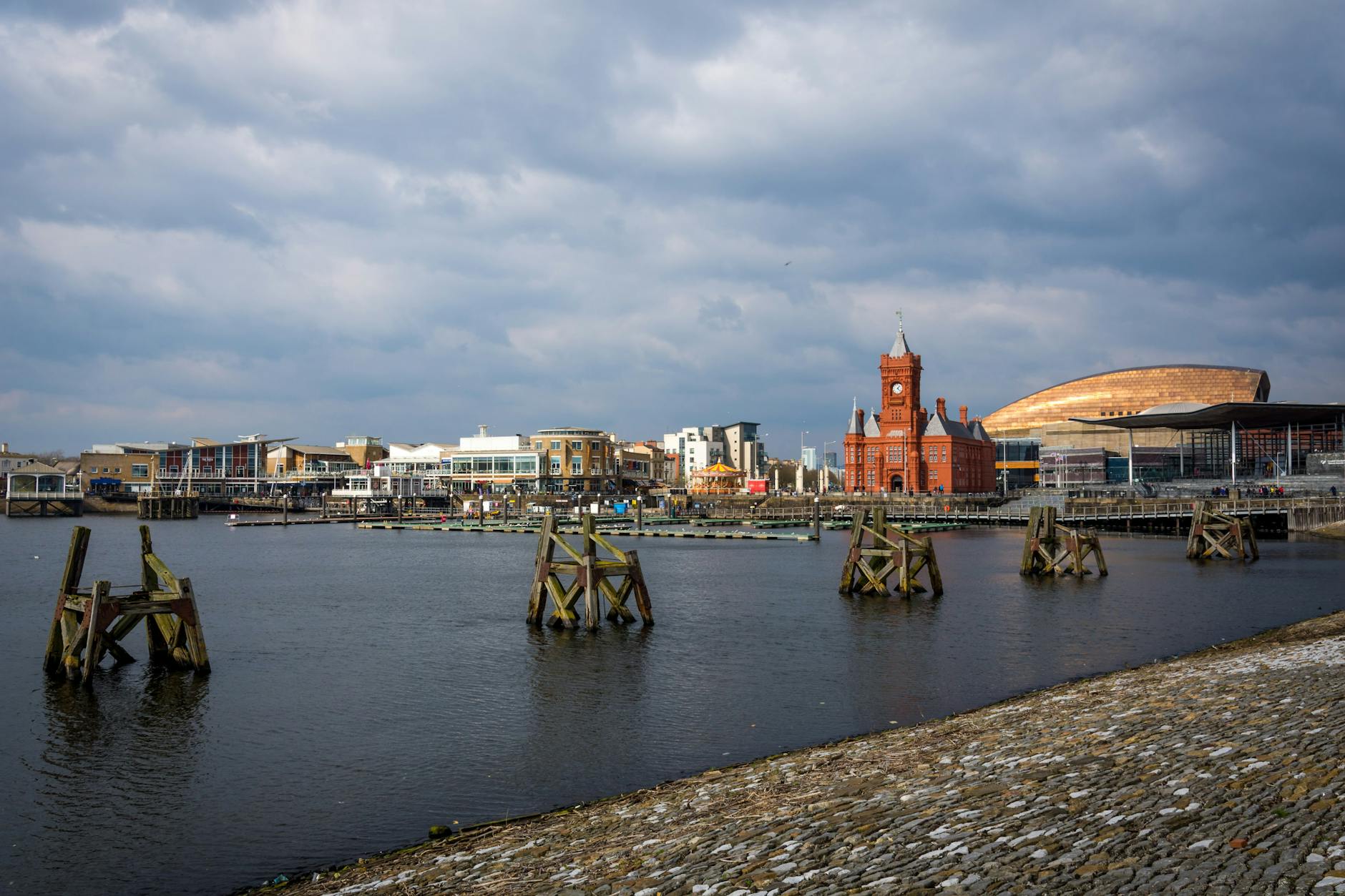 Scenic view of Cardiff Bay with the Pierhead Building and a tranquil waterfront.